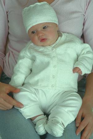 White knitted cardigan for a baby