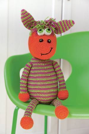 Bright and quirky striped crocheted horse with boggle eyes