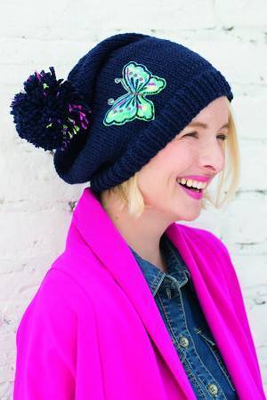 Ladies' navy winter hat with bobble and embroidered butterfly