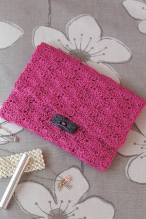 Crocheted evening clutch bag