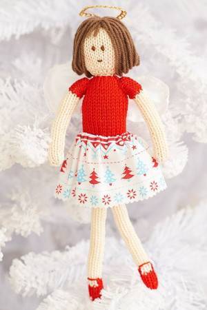 Knitted Christmas fairy with knitted jumper and shoes with fabric skirt and wings