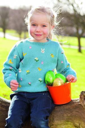 Knitted jumper for girls with Easter motifs