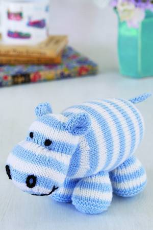 Blue and white striped knitted hippo toy