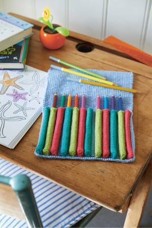 Knitted pencil case with individual narrow pockets for each pencil