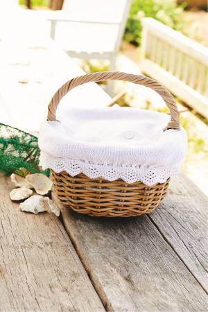 Fresh white knitted picnic basket cover with pretty trim