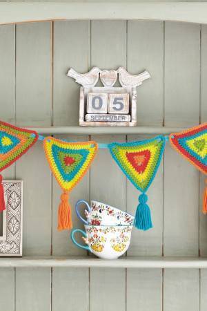 Crocheted string of rainbow bunting