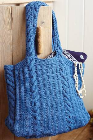Knitted bag with cable handles and verticle cables and ribs