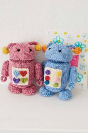 Pink and blue knitted robot toys