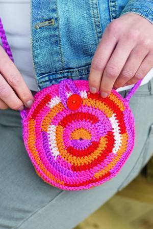 Round crocheted bag with a circular pattern 