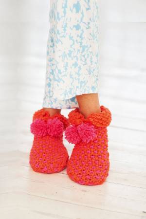 Knitted and crocheted bootee style slippers with pom-poms