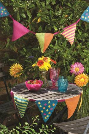 Colourful knitted bunting with spots, stripes and plain triangles
