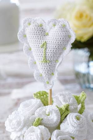 Crocheted heart wedding table decoration
