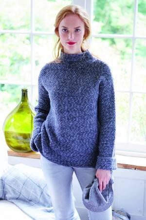 Women's knitted sweater with a funnel neck