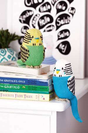 Colourful knitted budgie toys with stripes