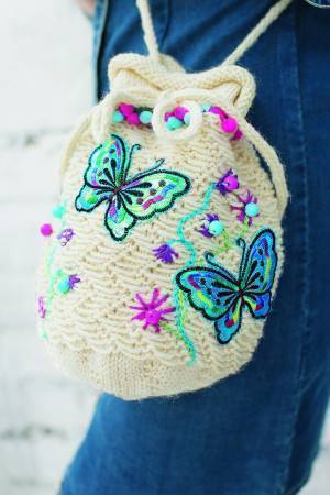 Small knitted drawstring bag with butterflies