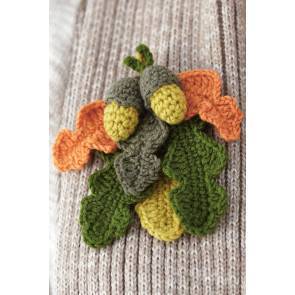 Crocheted acorn and oak leaf corsage with autumn colours