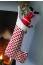 Knitted chimney stocking with Santa toy