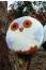 Circular crocheted owl cushion