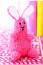Pink knitted bunny toy